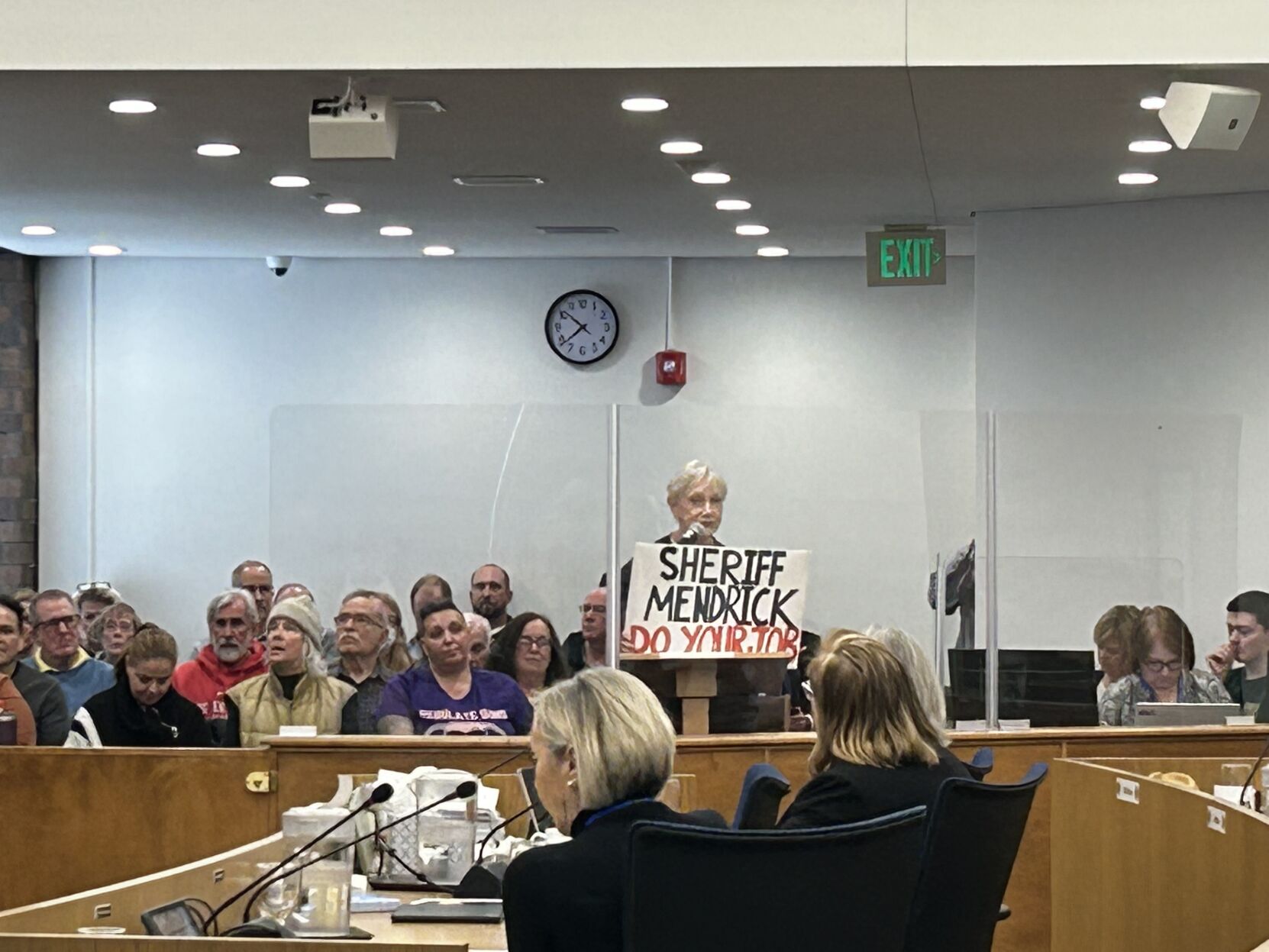 Illinois residents attend the DuPage County Board meeting Tuesday, Jan. 24, 2023.